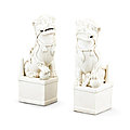 A pair of large white-glazed seated buddhist lions, qing dynasty, kangxi period (1662-1722)