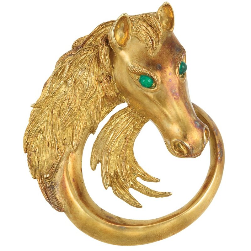 Lot-373-Gold-and-Cabochon-Emerald-Horse-Head-Clip-Brooch-Van-Cleef-Arpels