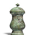 An archaic bronze wine vessel and cover, zhi, shang dynasty