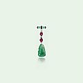An art deco jade, ruby and onyx pendant brooch, by cartier