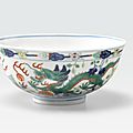 A wucai-decorated dragon and phoenix bowl, guangxu six-character mark and of the period (1875-1911)