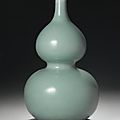 A celadon-glazed double-gourd vase. qianlong seal mark