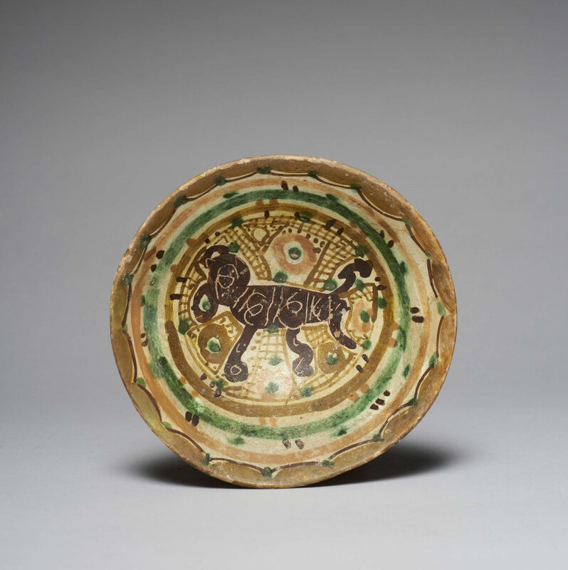 A Samanid slip-painted pottery cup with an animal, circa 10th century. Diam. : 18,2 cm