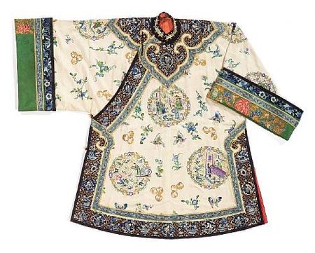 A_woman_s_cream_brocade_silk_ground_three_quarter_length_coat_with_elaborate_embroidered_decoration