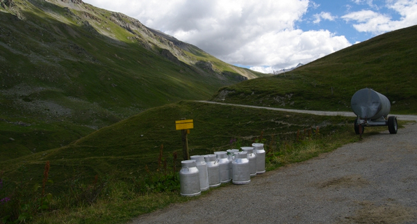milk_cans_in_mountain_panorama