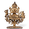 A small gilt-bronze 'bodhisattva' group, ming dynasty (1368-1644)