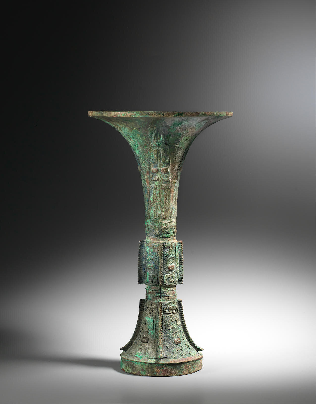 A very rare archaic bronze ritual wine vessel, Gu, Shang Dynasty (c