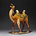 A large sancai-glazed pottery figure of a striding Bactrian camel, Tang dynasty (618-907)