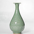 A fine carved 'longquan' celadon vase (yuhuchun ping), yuan dynasty (1279-1368)