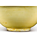 A massive yellow-glazed bowl, kangxi mark and period (1662-1722)