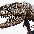 A massive bronzed fibreglass model of a tyrannosaurus rex