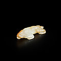 A white and russet jade carving of a tiger, song-ming dynasty (960-1644)