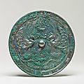 A rare bronze 'Double Phoenix' mirror with inscription, Tang dynasty