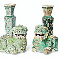 Two biscuit-glazed buddhist lion vases, kangxi period (1662-1722)