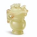 A yellow jade archaistic ewer and cover, qing dynasty, qianlong period (1736-1795)