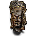 A grey limestone head of a bodhisattva, possibly late northern wei dynasty, 6th century