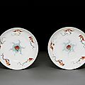 An unusual pair of 'famille-rose' 'peach and bat' dishes, seal marks and period of qianlong (1736-1795)