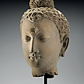 A life-size stucco head of buddha, gandhara, 3rd-4th century