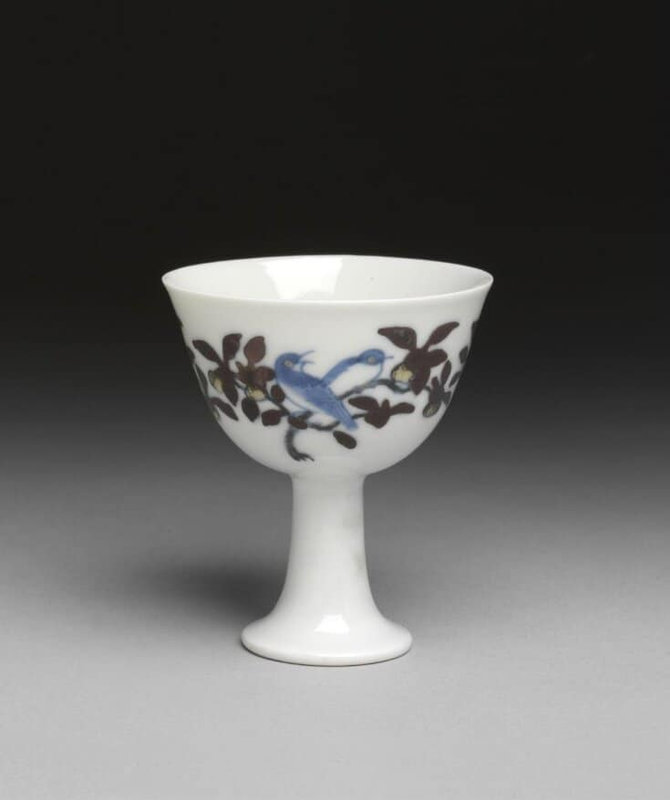 Porcelain wine cup painted in doucai style with birds and branches, China, Ming dynasty, Chenghua mark and period (1465-1487)