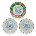 A pair of rare chinese blue and white armorial plates and a third rare chinese armorial plate, kangxi period (1662-1722)