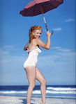 1949_tobey_beach_by_dedienes_umbrella_red_042_2