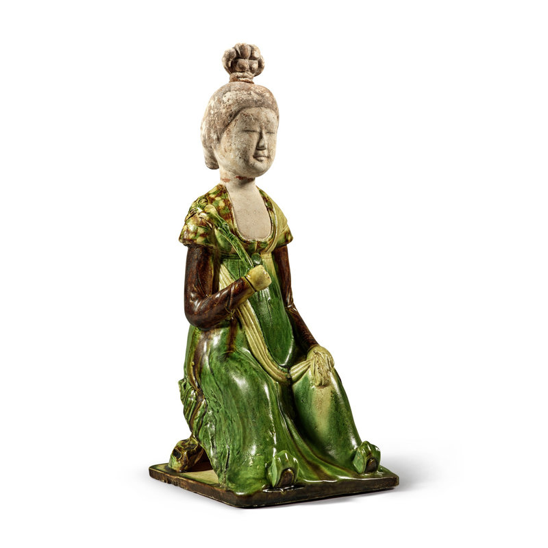 A sancai-glazed pottery figure of a seated court lady, Tang dynasty