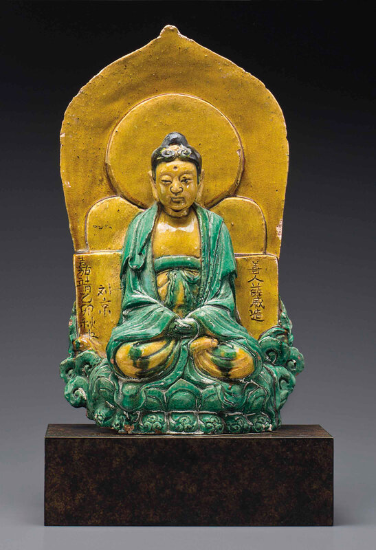 A dated sancai-glazed stoneware figure of Buddha, dated to mid-autumn of the yimao year of Jiajing, corresponding to 1555, and of the period