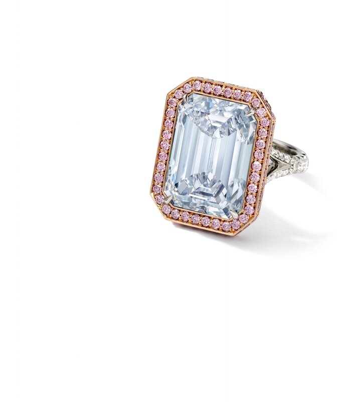 A Rare Fancy Blue Diamond and Diamond Ring