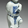 An unusual blue and white boy-form waterdropper, Wanli period (1573-1619)