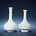 Two white-glazed bottle vases, 18th century