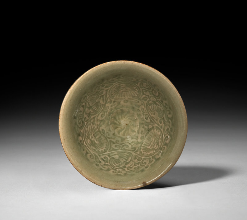 A small molded Yaozhou celadon bowl, Northern Song-Jin dynasty (960-1234)
