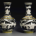 A pair of grisaille-decorated black-ground vases, guangxu six-character marks in underglaze blue and of the period (1875-1908)