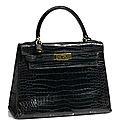An hermès black crocodile kelly handbag