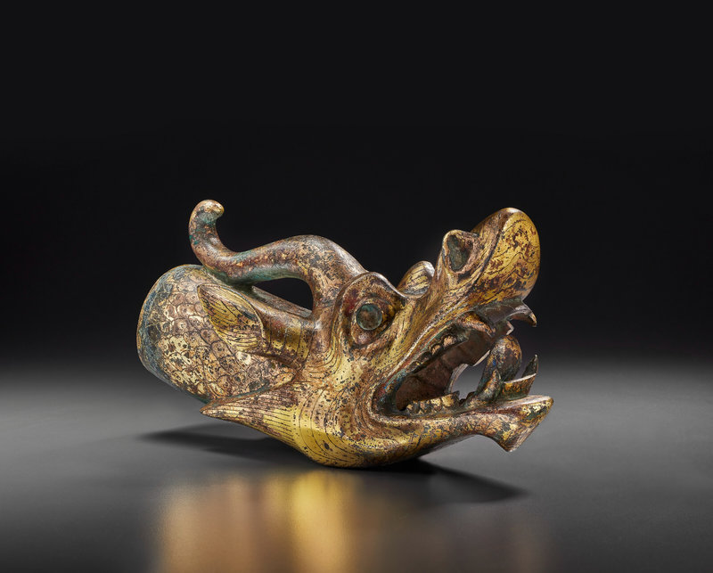 2022_NYR_20594_0730_006(a_magnificent_and_very_rare_large_gilt-bronze_dragon_head_chariot_term043836)