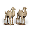 A pair of straw-glazed pottery camels, tang dynasty
