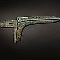 An exceptionally rare and important archaic bronze ceremonial halberd blade (ge), eastern zhou dynasty, early spring and autumn 
