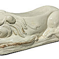 A rare cizhou-type white-glazed 'lion' pillow, northern song dynasty (960-1126)