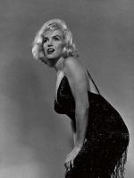 1959-10-NY-Jump_sitting-black_dress-by_halsman-010-1