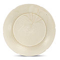 A dingyao carved 'lotus' dish, northern song dynasty (960-1127)