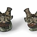 A pair of bronze dragon-head terminals, western zhou dynasty, 11th-10th century bc