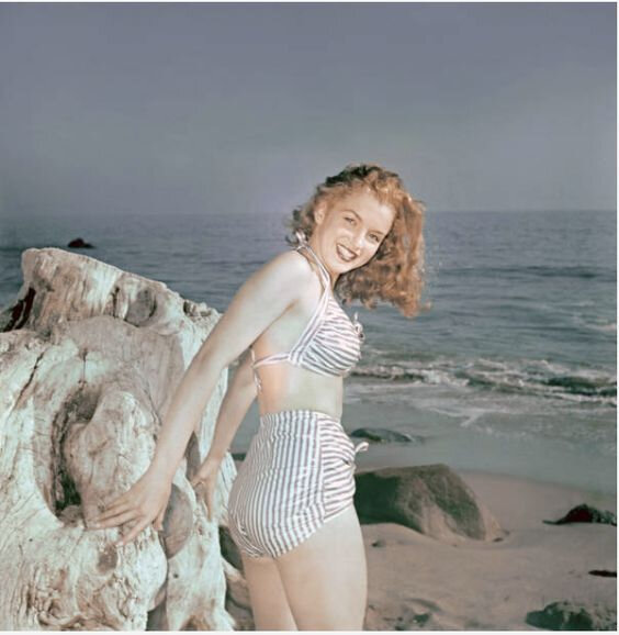 1946-03-26-beach-bikini_striped-012-1-by_miller-1