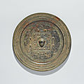 A round bronze mirror of LTV- type, Han dynasty