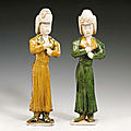 A Pair of Sancai-Glazed Pottery Figures of Falconers, Tang Dynasty (618-906)