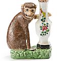 A chinese export porcelain famille-rose figure of a monkey and vase, qianlong period, late 18th century