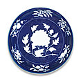 An exceptionally rare and large blue and white reserve-decorated 'peony' dish, xuande six-character mark in a line and of the pe