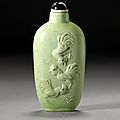 A lime green biscuit-glazed snuff bottle with 'five roosters' design. kangxi mark