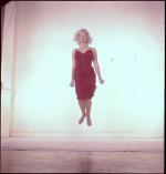 1959-10-NY-Jump_sitting-red_dress-by_halsman-025-1